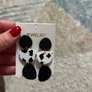 Dangle drop cow print black earrings